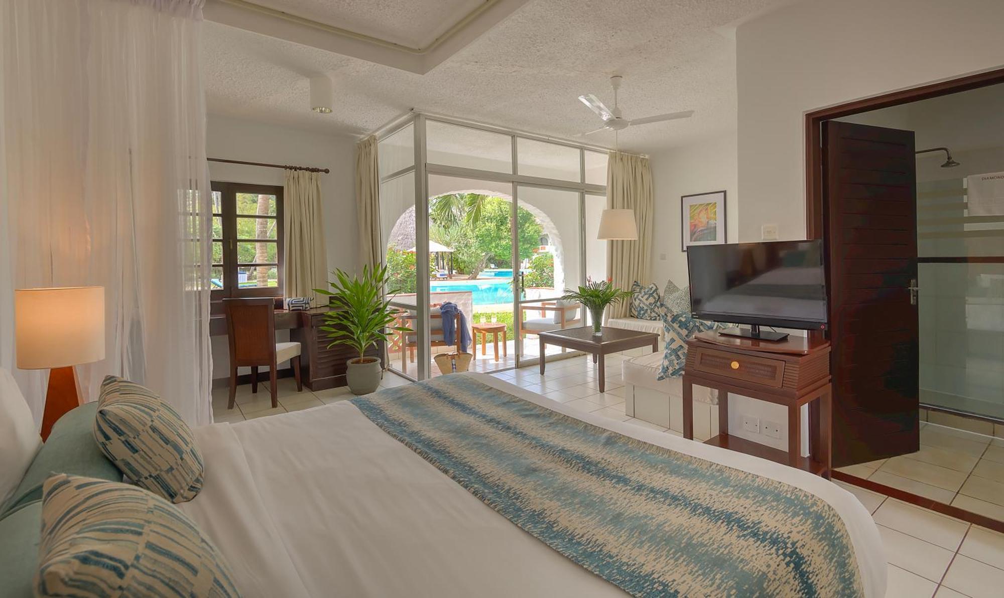 Diamonds Leisure Beach & Golf Resort Diani Beach Szoba fotó A room at the hotel